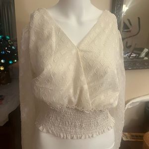 New. Very nice top. Sheer.